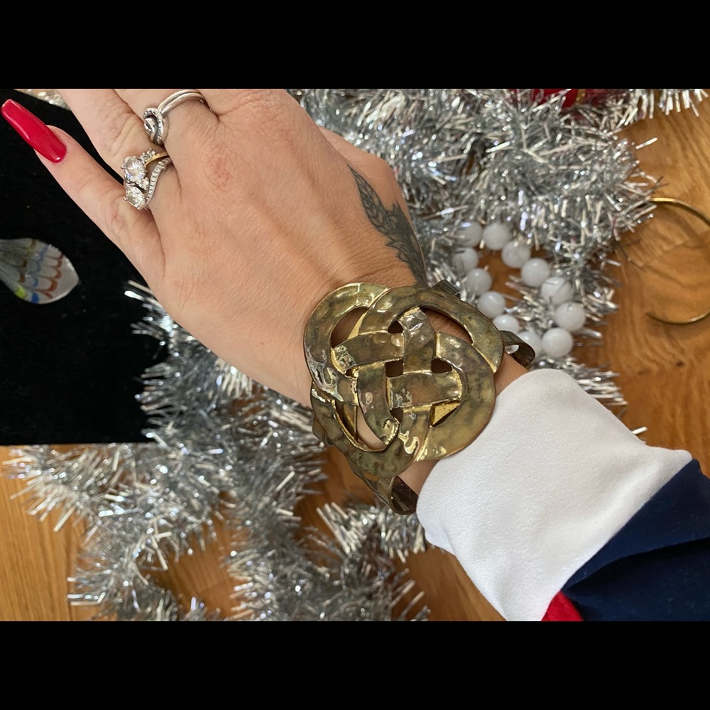 Gold tone express bracelet